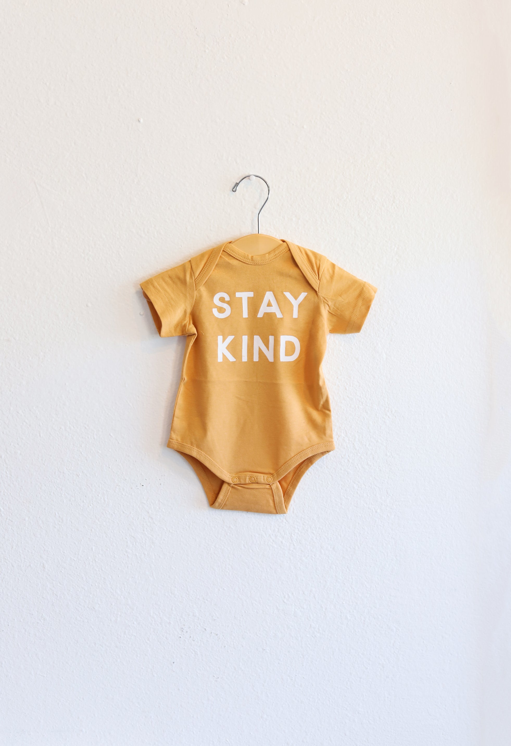 Stay Kind Organic Baby Bodysuit Polished Prints   