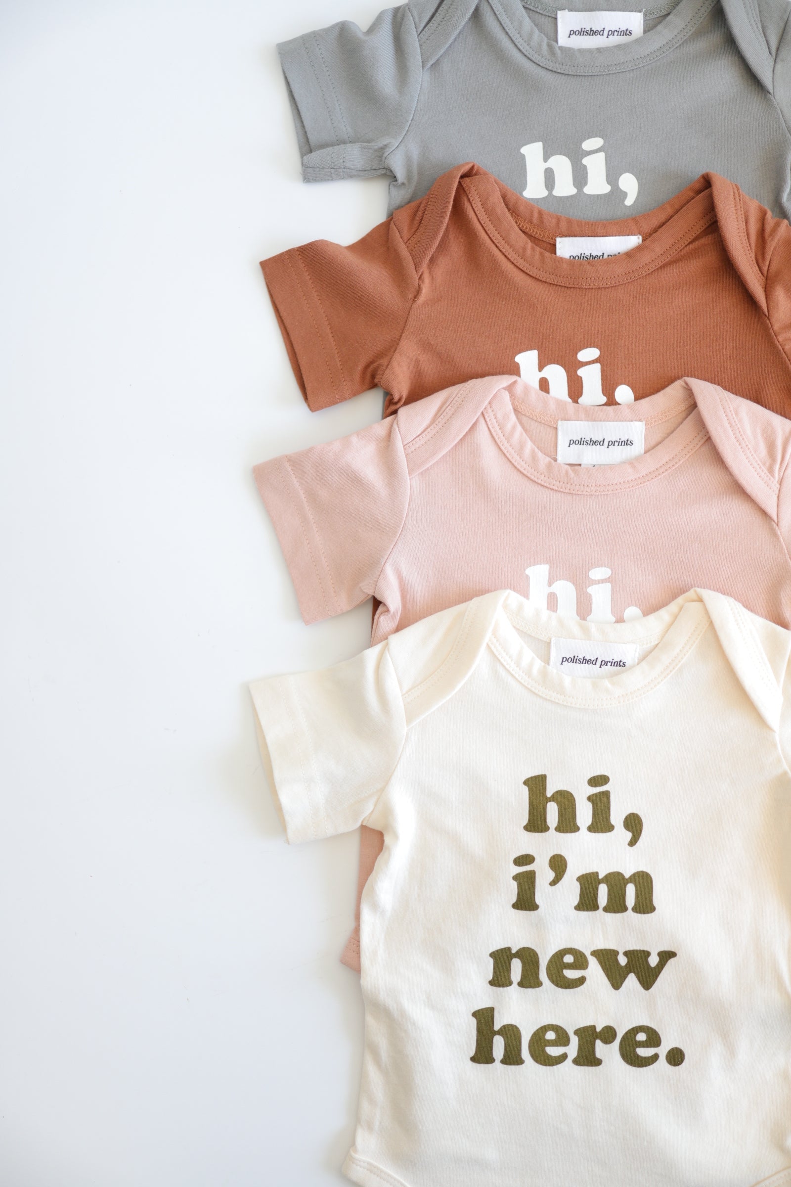 Hi, I'm New Here Baby Onesie in Moon Mist Polished Prints   