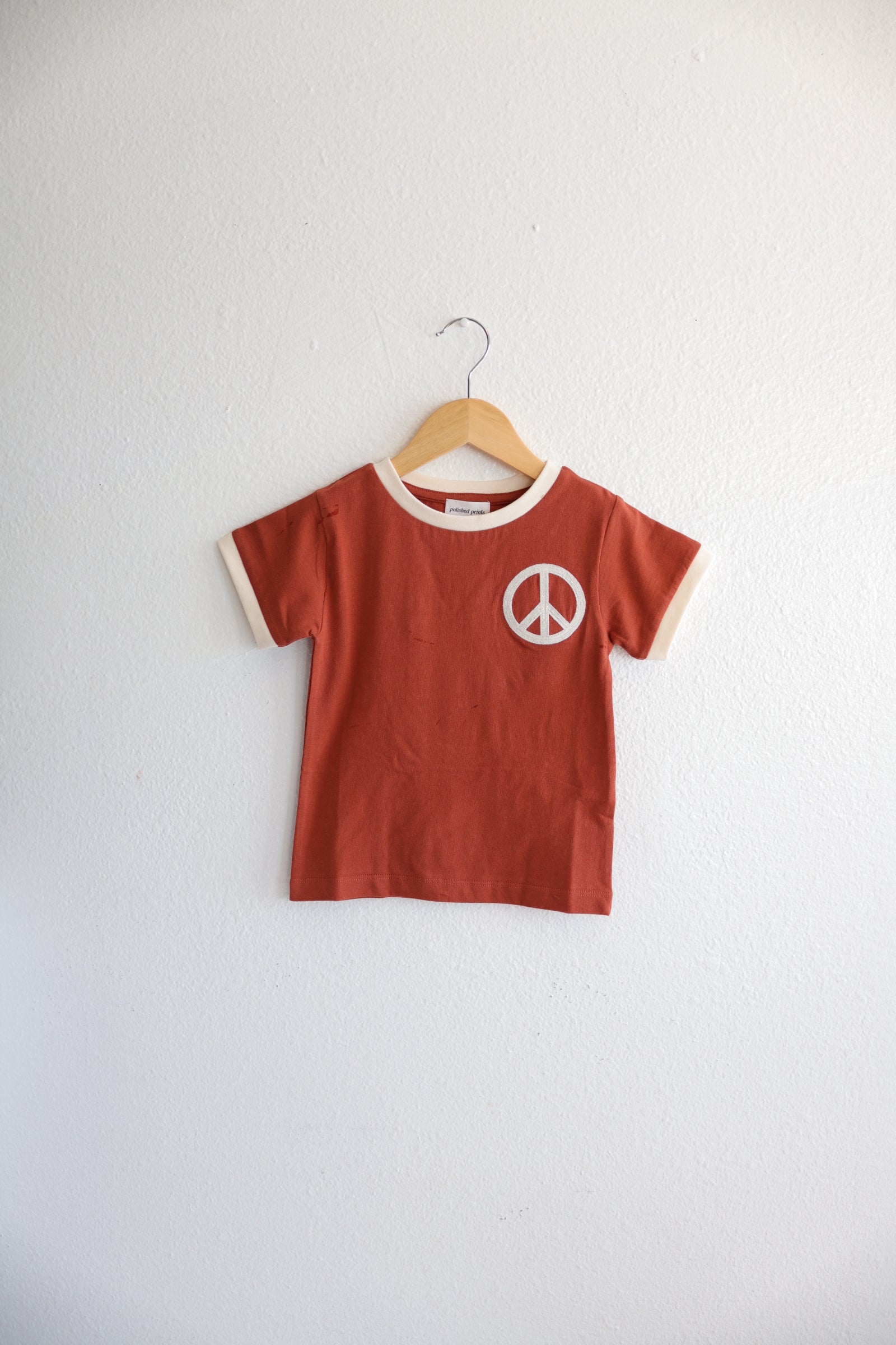 Peace Embroidered Ringer in Auburn Polished Prints   