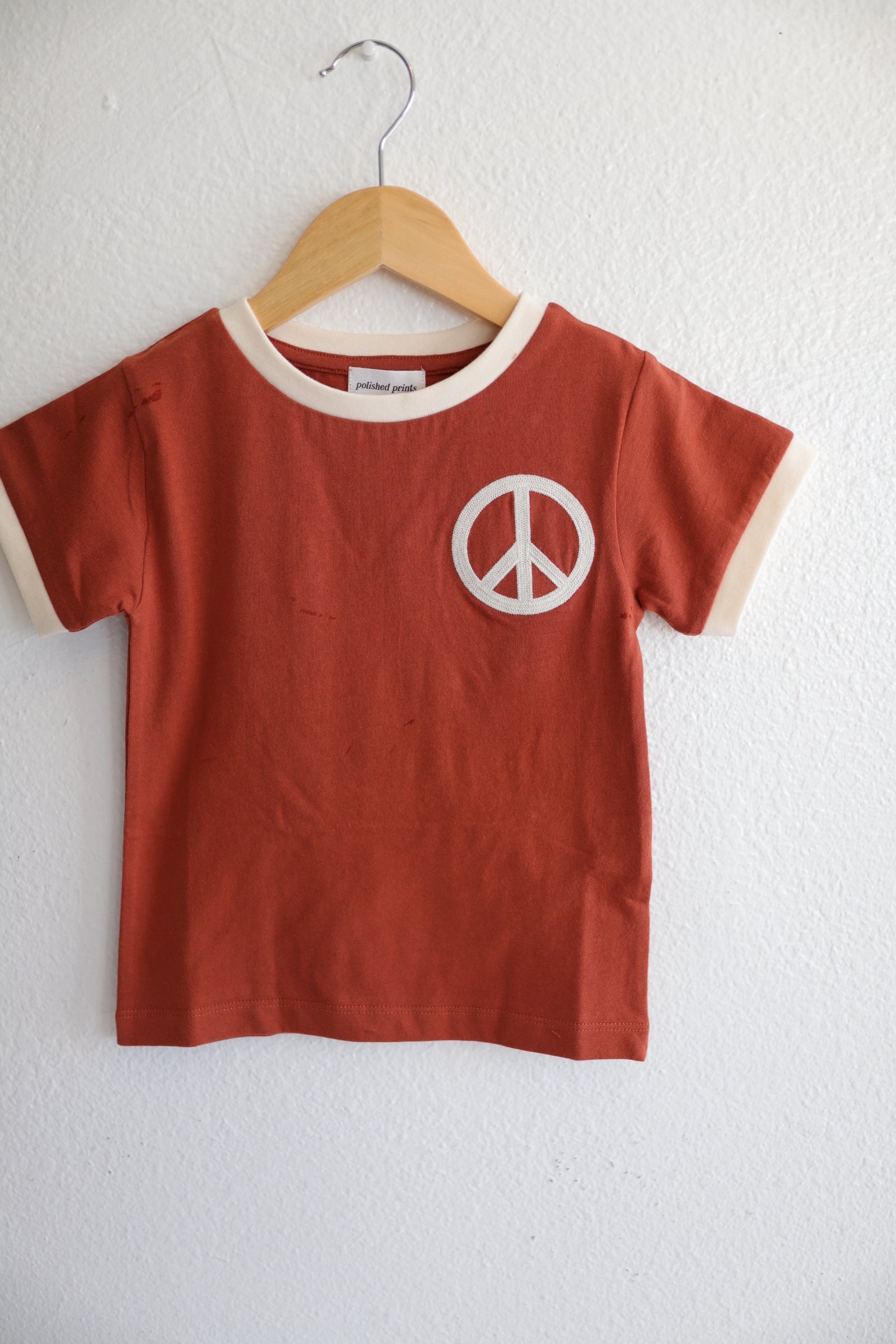 Peace Embroidered Ringer in Auburn Polished Prints   