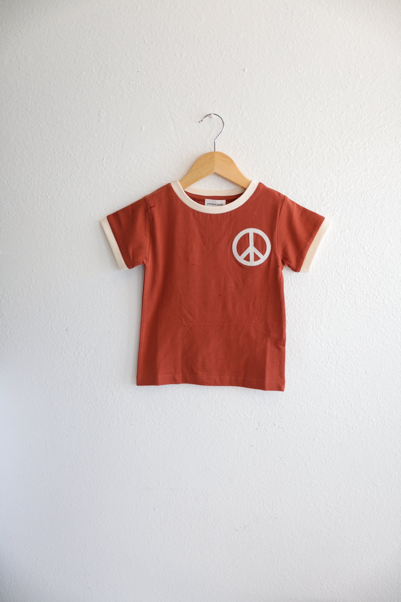 Peace Embroidered Ringer in Auburn Polished Prints   