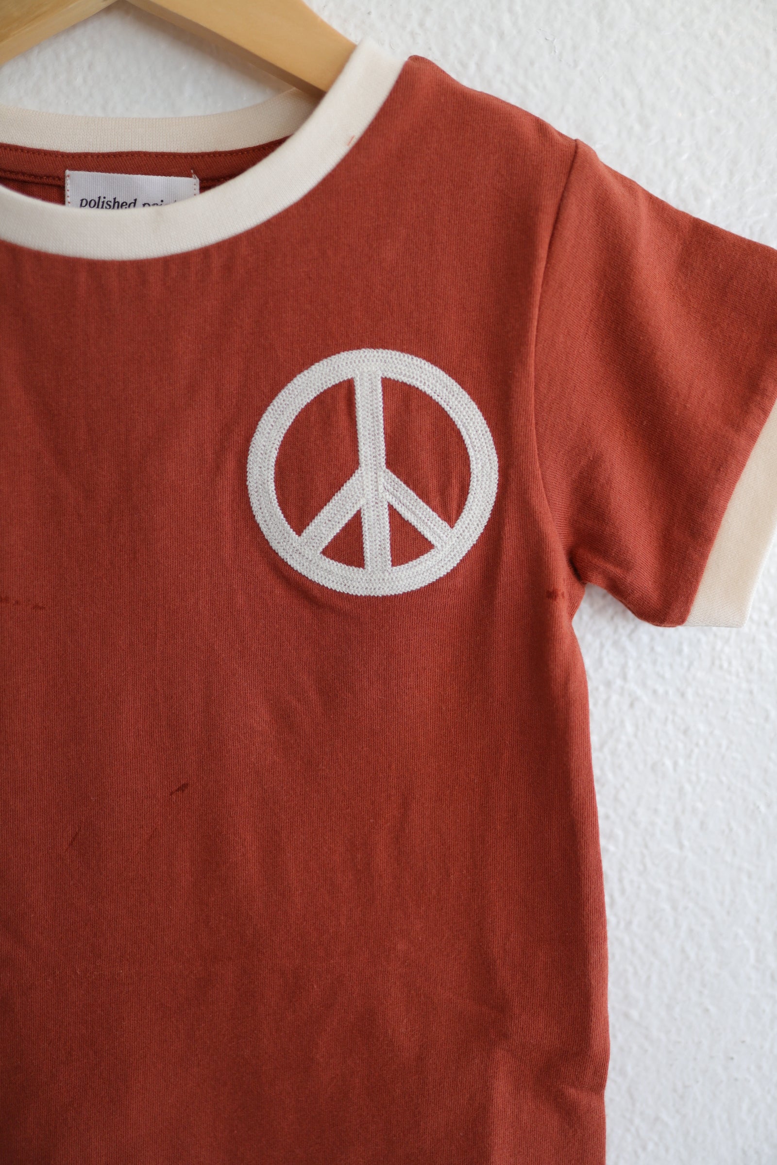 Peace Embroidered Ringer in Auburn Polished Prints   